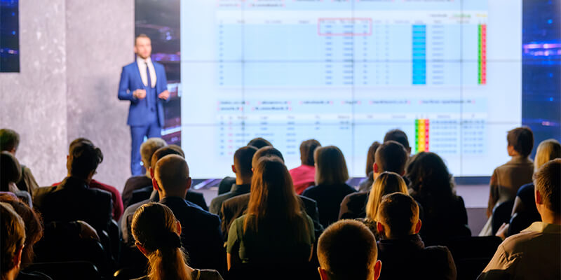 Man On Stage At Conference